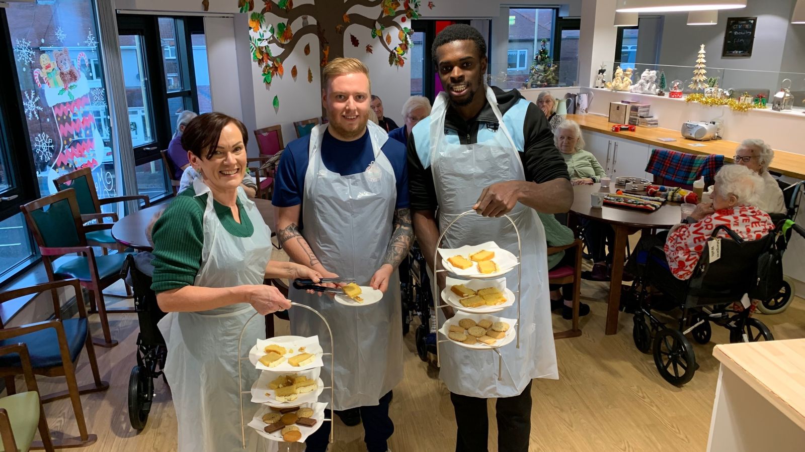 Haven Court's Sarah Sasmazer with Jack Pringle and Jed Abbey during their visit to the home..jpg